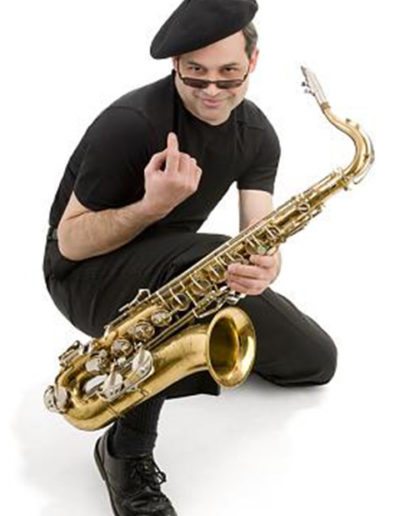 Fun musicians portrait holding a saxophone on a white background