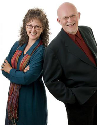 Professional partners pose on a white background in studio