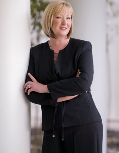Professional business woman portrait with columns