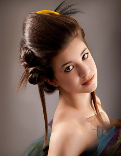 Modelling portrait of woman with makeup and hair styling